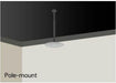 Pole-mounted ceiling speaker installation showing white round speaker suspended from ceilin