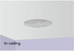 Round Pyle in-ceiling speaker with white grille and green mounting clips for flush home audio installation