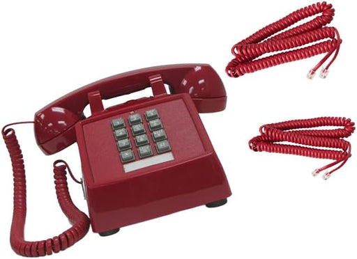 Red vintage push button desk telephone with handset and matching coiled replacement phone cords.