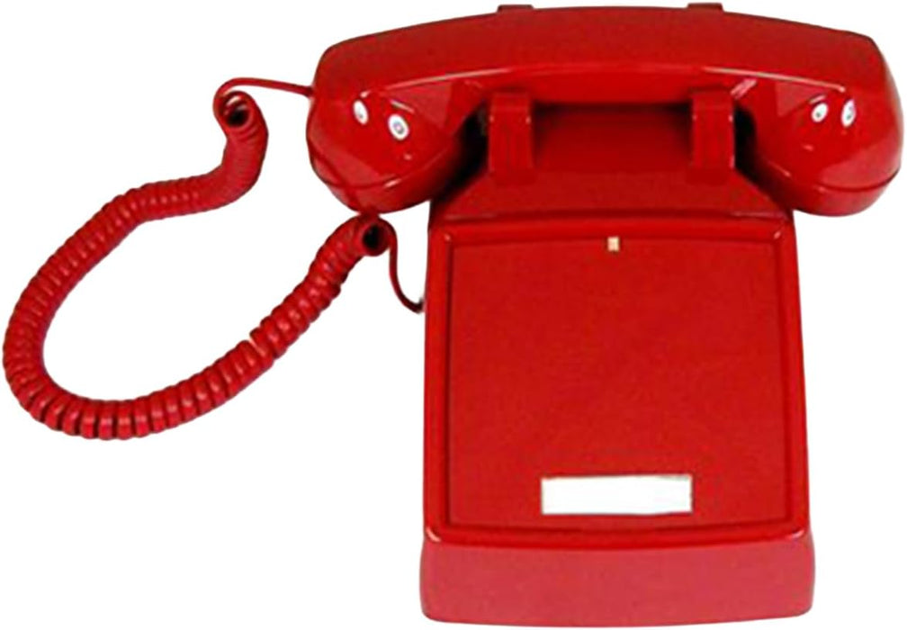 Red vintage wall mounted corded telephone with handset and coiled cable
