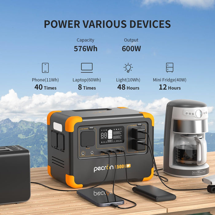 Pecron E500LFP 576Wh portable power station powering phone, laptop, light, and mini fridge outdoors