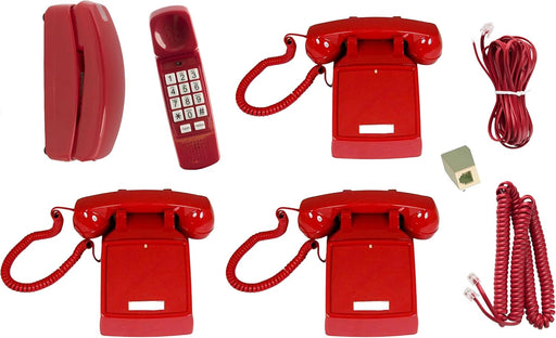 Red vintage telephone on office desk with corded receiver and classic retro design