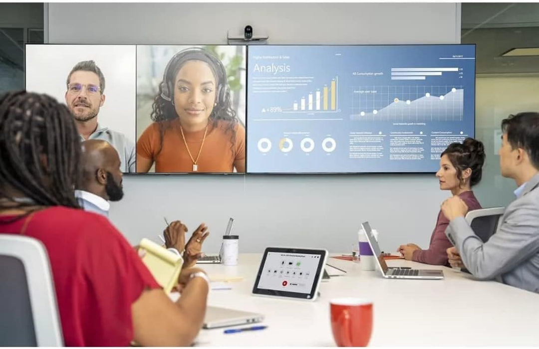 Poly G7500 video conferencing system in modern meeting room with large display, remote participants, and presentation screen.