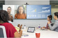 Poly G7500 video conferencing system in modern meeting room with large display, remote participants, and presentation screen.